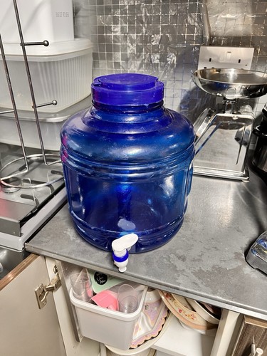 Jug with tap - with,